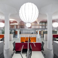 View of the office spaces with their light and modern interiors