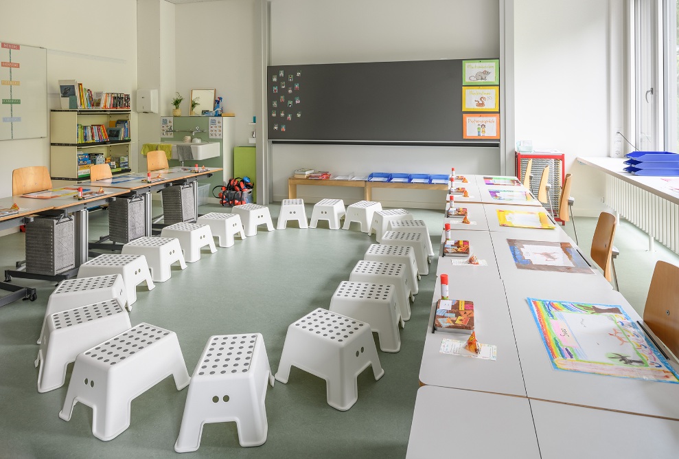 Interior view of bright classroom in the temporary St.Karli school building in Lucerne 